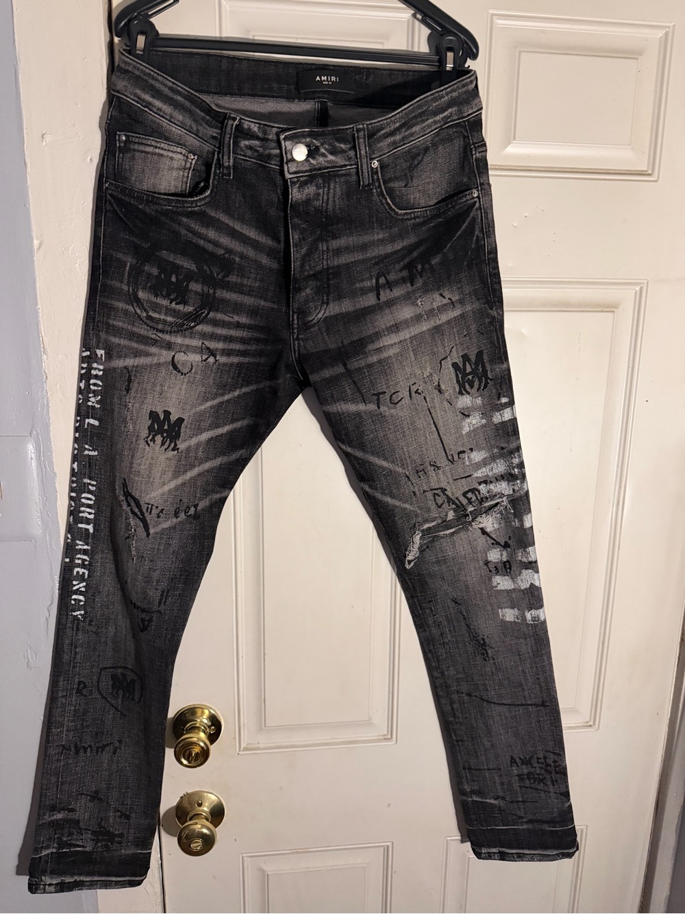 AMIRI Black Washed Skinny Jeans with Graffiti Print